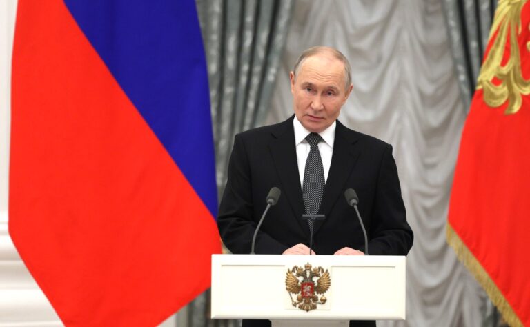 Путин
