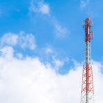 Telecommunication tower with beautiful sky .